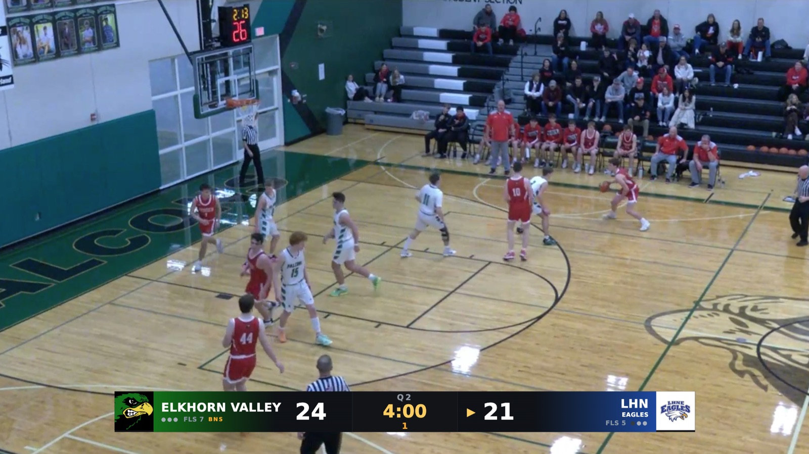A live FalconCast basketball broadcast with a professional score bug: team logos, Elkhorn Valley 24, LHN Eagles 21, second quarter, 4:00 on the clock, fouls and bonus indicators.